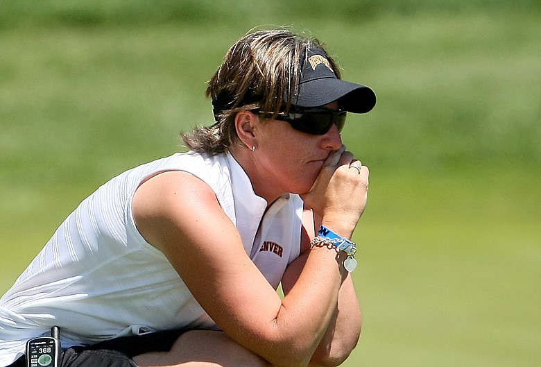 Univeristy of Denver head coach Sammie Chergo watches her players at No. 9 during the 2009 NCAA Women's Golf Championships at Caves Valley Golf Club in Owings Mills, Md.