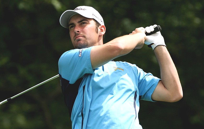 Scott Lewis hits a shot during a practice round for the U.S. Open. Lewis replaced Dudley Hart, who withdrew with an injury.