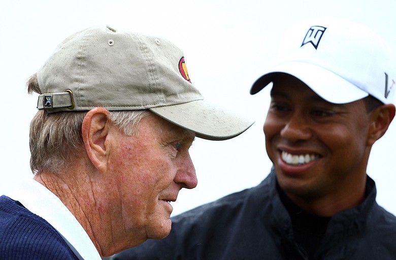 Jack Nicklaus and Tiger Woods wait on the tenth tee during a skins game prior to the start of the 2009 Memorial Tournament.