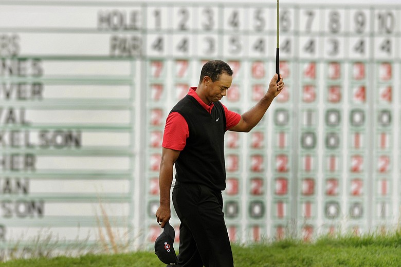Tiger Woods walks off the 18th green during the final round of the U.S. Open.