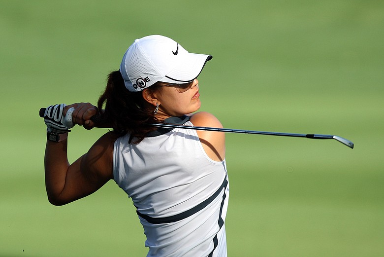Michelle Wie hits her second shot at the 12th hole during the first round of the 2009 Kraft Nabisco Championship.