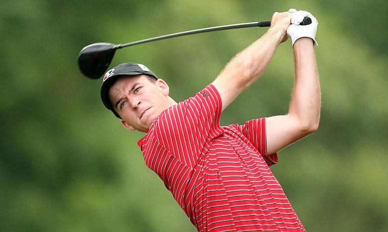 Amateur Nick Taylor plays his tee shot on the ninth hole during the continuation of the third round of the 109th U.S. Open.