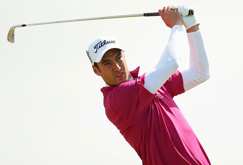 Ross Fisher of England tees off on the 6th hole during the final round of the 138th Open Championship.