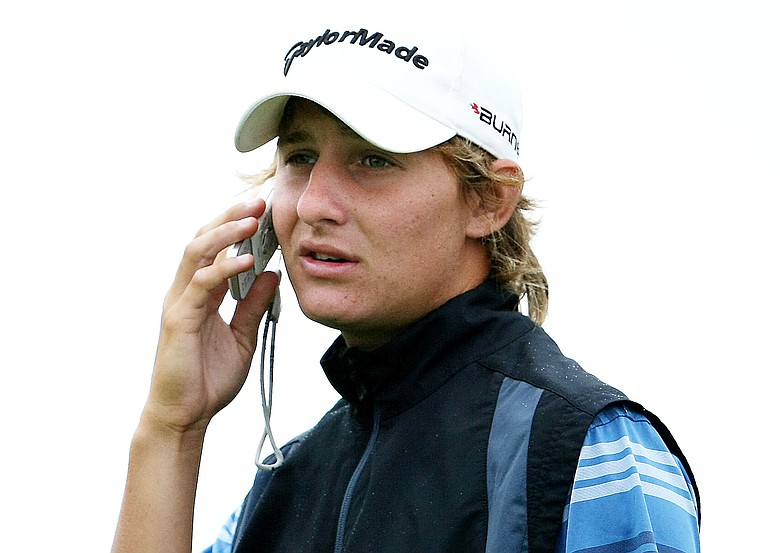 Emiliano Grillo talks on his cell phone prior to his round Tuesday at the 62nd U. S. Junior Amateur Championship.