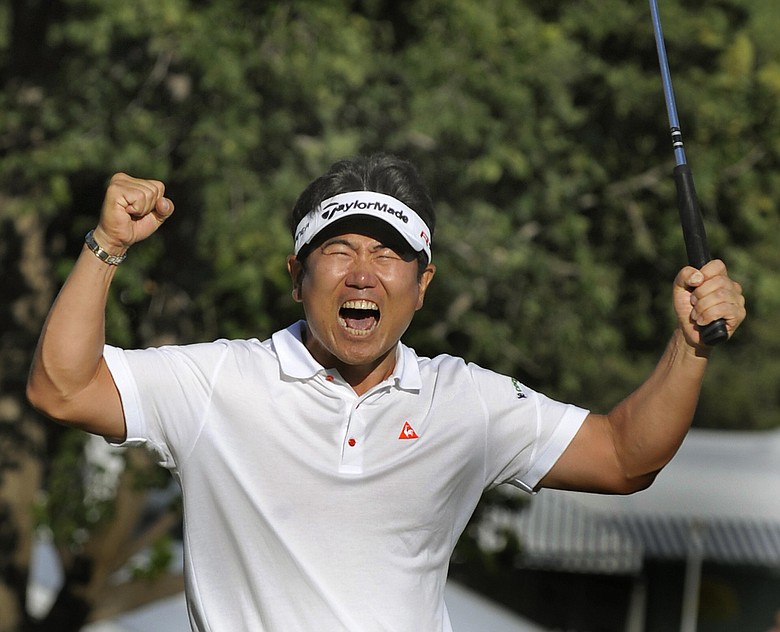 Y.E. Yang reacts after winning the PGA Championship at the Hazeltine National Golf Club.