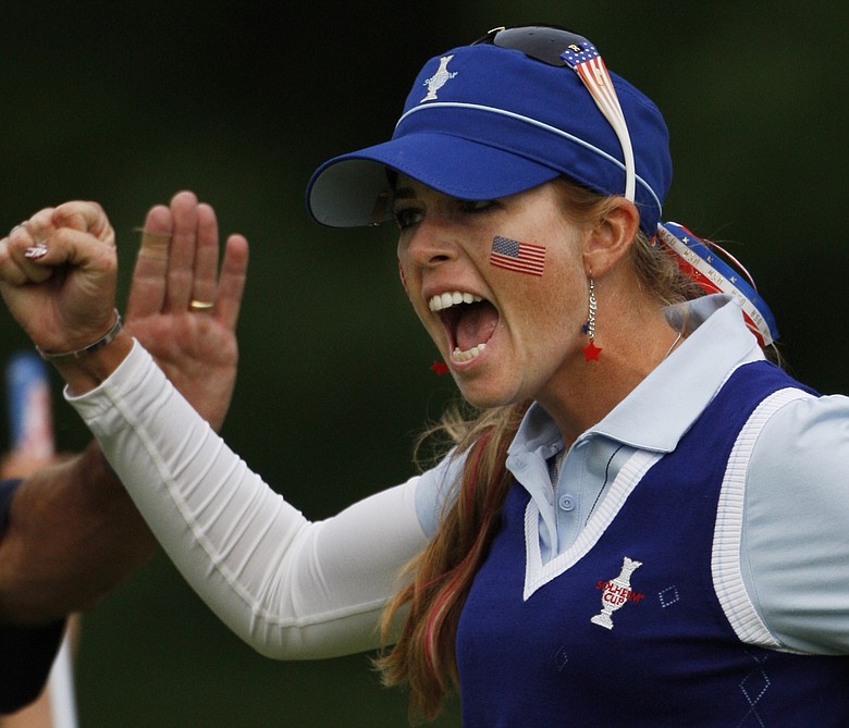 Paula Creamer celebrates a made putt on Day 1 of the Solheim Cup.