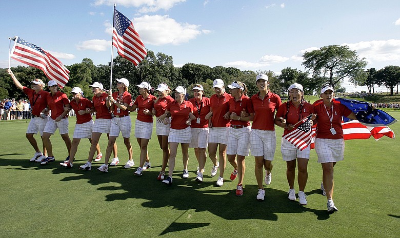 Team USA celebrates its Solheim Cup victory at Rich Harvest Farms. The Americans topped Europe 16-12 to retain the cup.