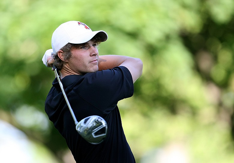 Peter Uihlein hits a shot at the NCAA Championship in May.