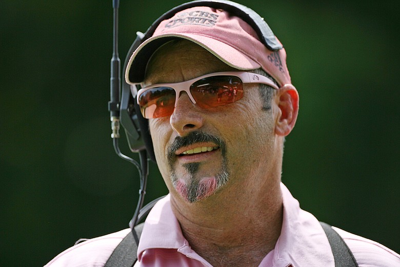 CBS Sports golf analyst David Feherty wears a pink outfit in support of Amy Mickelson and breast cancer research during the third round of the Crowne Plaza Invitational at Colonial Country Club.