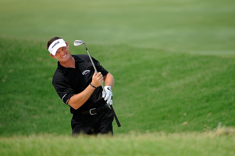 Alex Cejka of Germany reacts to a shot on the third hole during the final round of THE PLAYERS Championship.