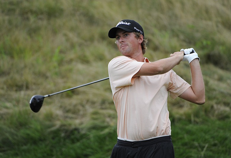 Webb Simpson tees off on No. 8 during the Round 2 of The Barclays at Liberty National Golf Club in Jersey City, N.J.