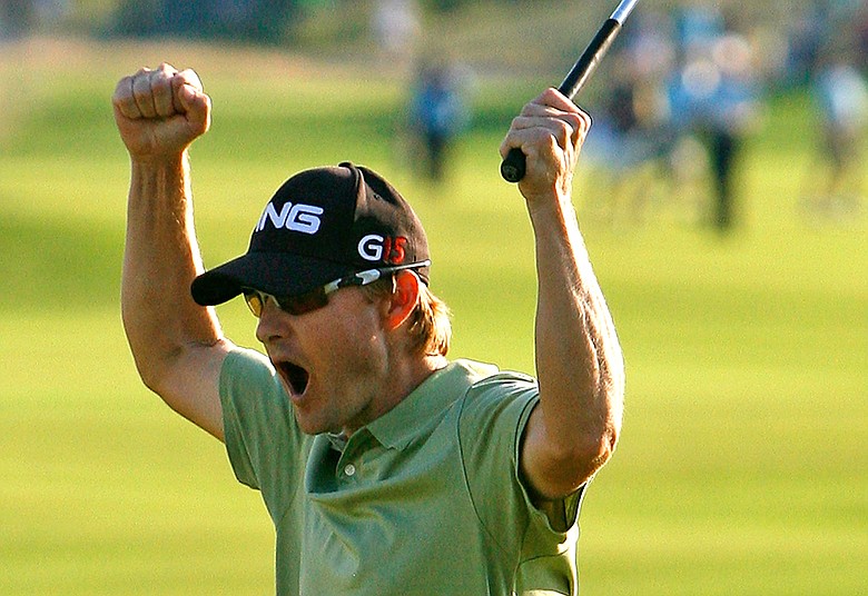 Heath Slocum reacts after sinking his par putt on the 18th green to win The Barclays.