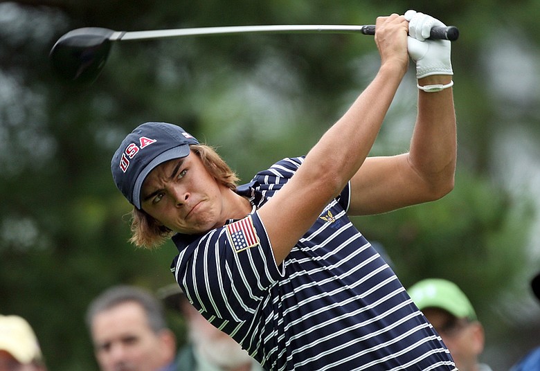Rickie Fowler hits his tee shot at the second hole during the afternoon singles matches at the Walker Cup.