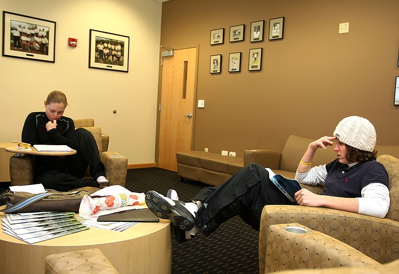 Players study before practice at Purdue's Birck Boilermaker Golf Complex.