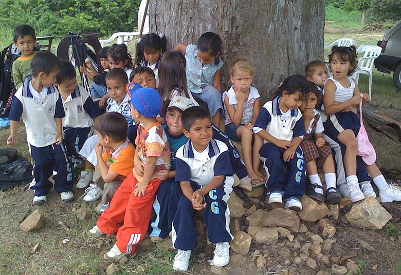 Children gather at Anthony Ciabattoni's golf facility near Bucaramanga, Colombia.