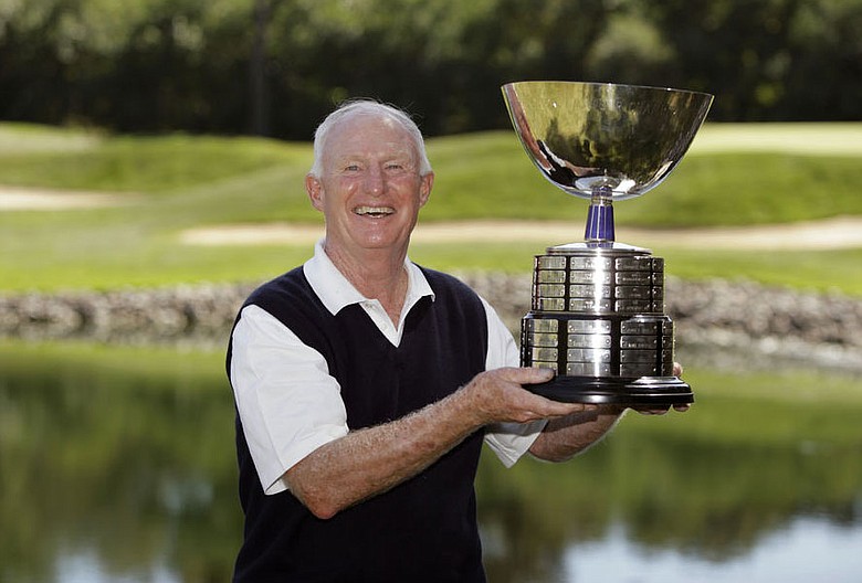 Vinny Giles III holds the trophy after winning the USGA Senior Amateur Sept. 17.