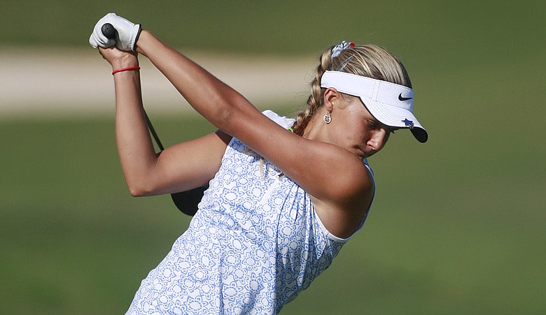 Alexis Thompson, 14, hits her drive on the 12th tee during Round 2 of the Navistar LPGA Classic.