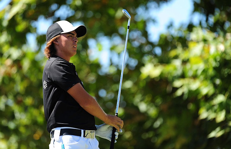 Rickie Fowler birdied his final two holes to shoot a 6-under 65 Friday.