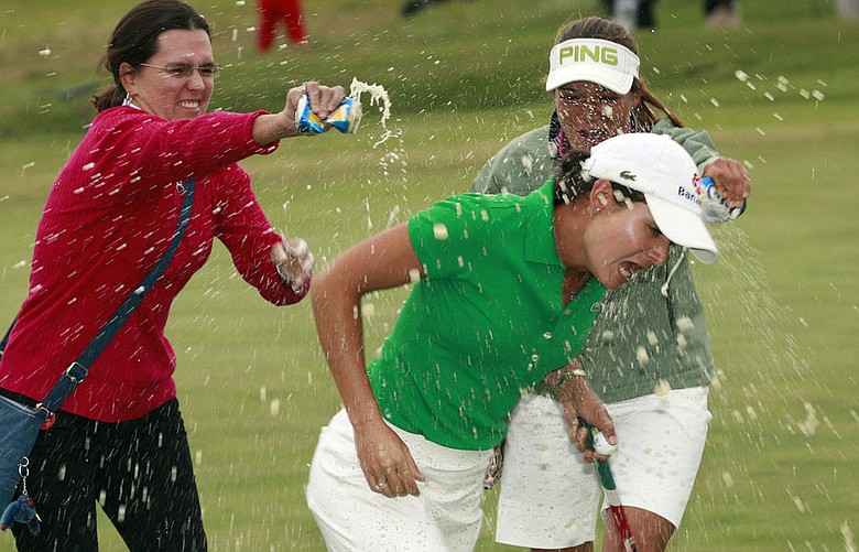 Lorena Ochoa gets doused by friends after winning the Navistar LPGA Classic Oct. 4.