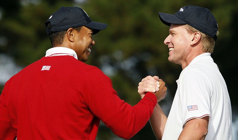 Tiger Woods and Steve Stricker celebrate their 6-and-4 win over Geoff Ogilvy and Ryo Ishikawa Oct. 8 at the Presidents Cup.