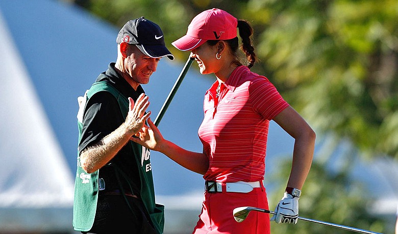 Brendan Woolley, left, and Michelle Wie at the LPGA Lorena Ochoa Invitational.