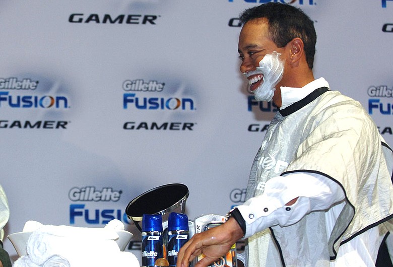 Tiger Woods participates in a promotion for the Gillette Fusion Power Gamer razor during the Gillette-EA Sports Champions of Gaming Finals in Orlando, Fla., Feb. 3, 2009.