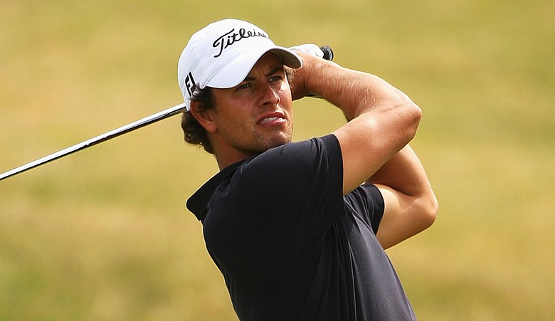 Adam Scott plays an approach shot during Round 3 of the Australian Open.