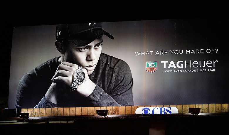 Tag Heuer will “downscale” its use of Tiger Woods’ image in advertising campaigns for the foreseeable future.