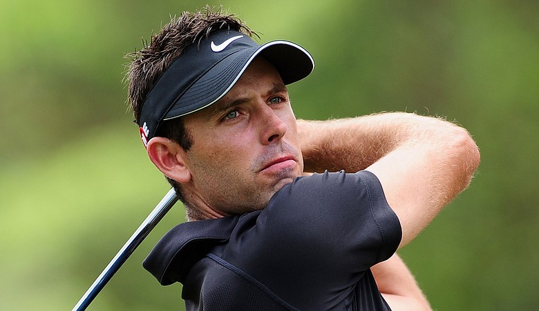 Charl Schwartzel plays his tee shot on the first hole during the final round of the Africa Open.