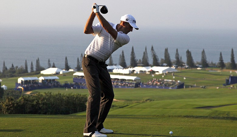 Geoff Ogilvy hits from the 18th tee during the third round of the SBS Championship.
