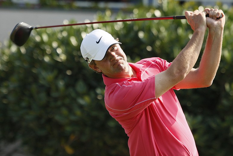 Lucas Glover during round three at Kapalua in an Aster Pink Nike polo.