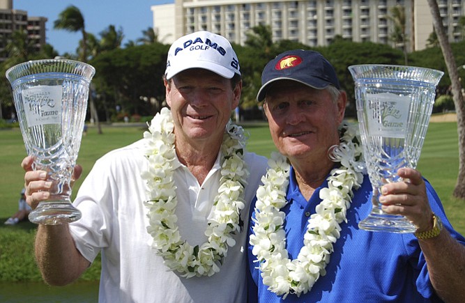 Tom Watson and Jack Nicklaus pose for a photo after winning the Wendy’s Champions Skins Game.
