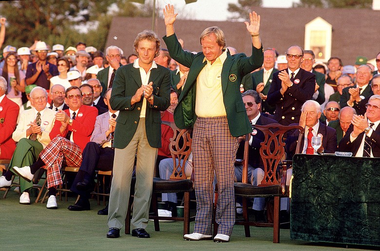 Jack Nicklaus receives the Green Jacket from 1985 winner Bernhard Langer.