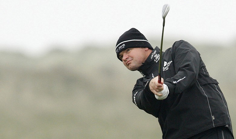 Paul Lawrie plays his second shot into the ninth hole during the first round the 2009 Irish Open.