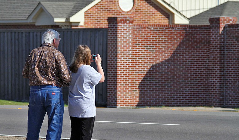 Residents photograph the Gentle Path facility in Hattiesburg, Miss., where it is speculated that Tiger Woods is being treated.