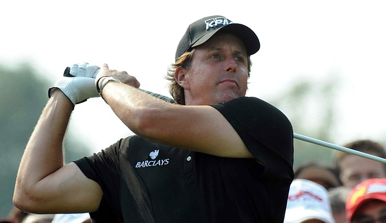 Phil Mickelson tees off during the final round of the HSBC Champions in November.