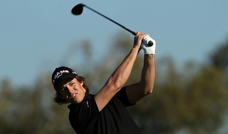 Aaron Baddeley tees off at Torrey Pines wearing Travis Mathew.