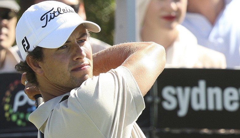 Adam Scott charged into Sunday play at the AT&T Pebble Beach National Pro-Am.