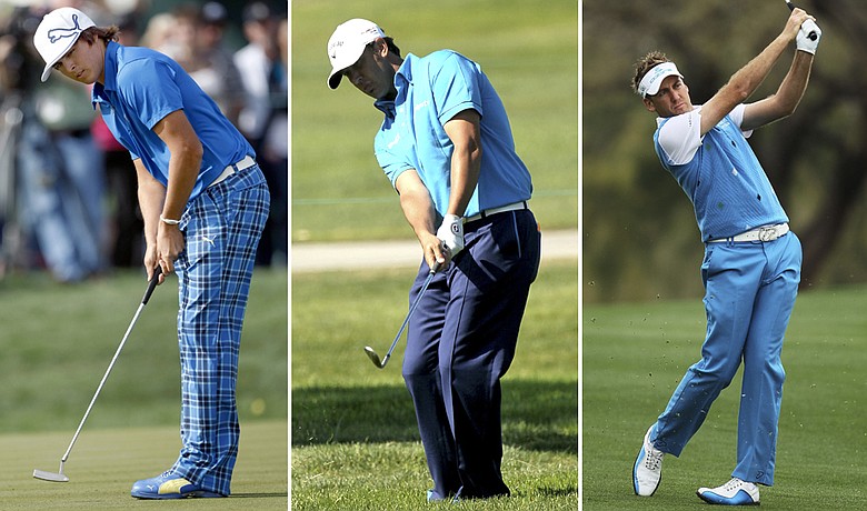 (Left to right) Rickie Fowler, Scott Piercy and Ian Poulter at the Waste Management Phoenix Open.