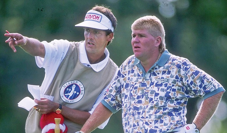 Greg Rita (left, shown in 1996) carried the bag for several major champions, including John Daly.
