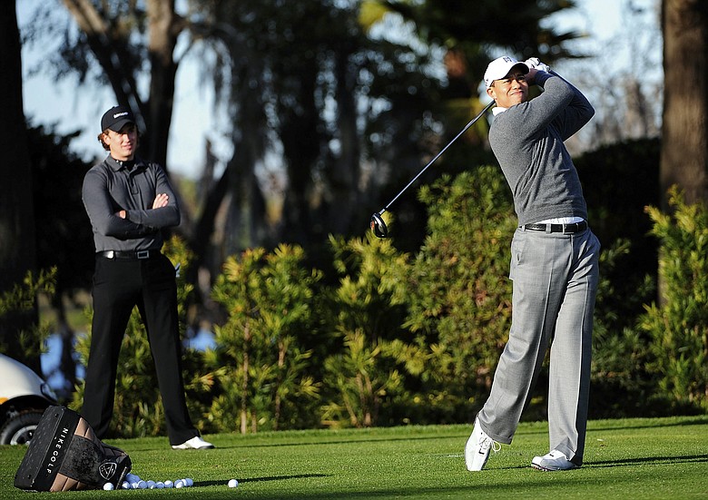 Tiger Woods practices at Isleworth on Feb. 18.