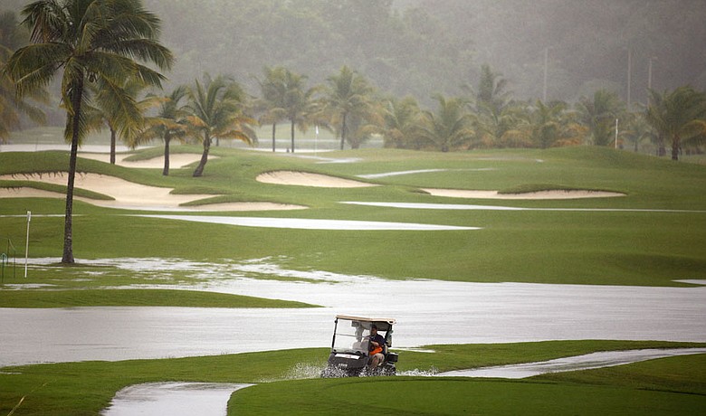 Only 18 players teed off Thursday at the Puerto Rico Open before rain pounded an already wet Trump International Golf Club and forced the postponement of the opening round.