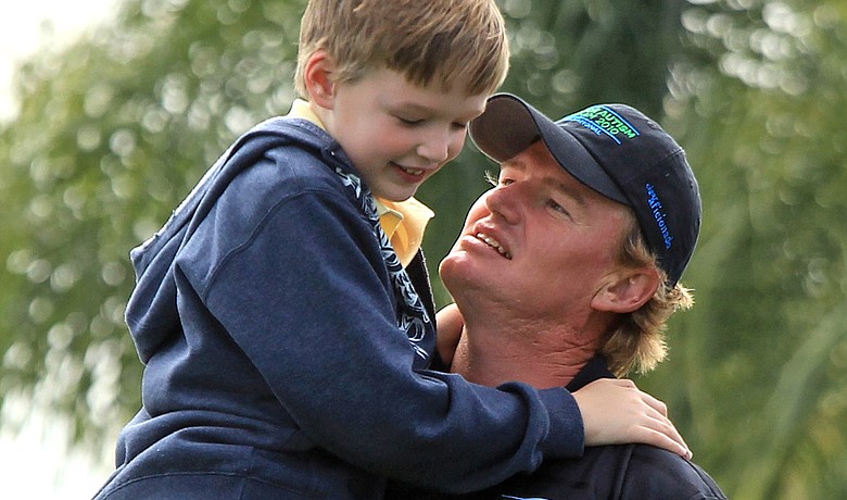 Ernie Els with his son Ben during the Els for Autism Pro-Am at the PGA National on March 15.