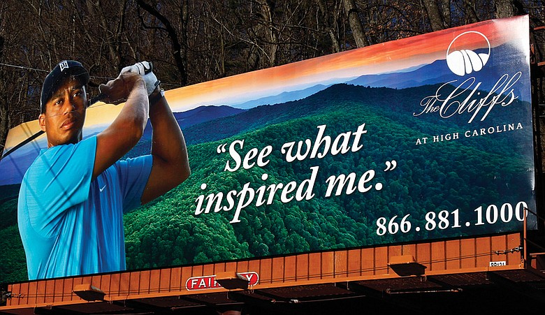 Tiger Woods appears on a billboard touting The Cliffs at High Carolina.