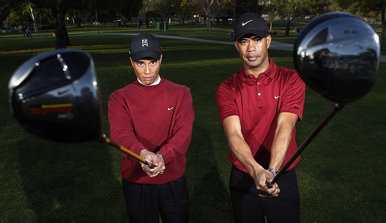 Cahn Oxelson, right, and Herme Chua have made a living as Tiger Woods impersonators.