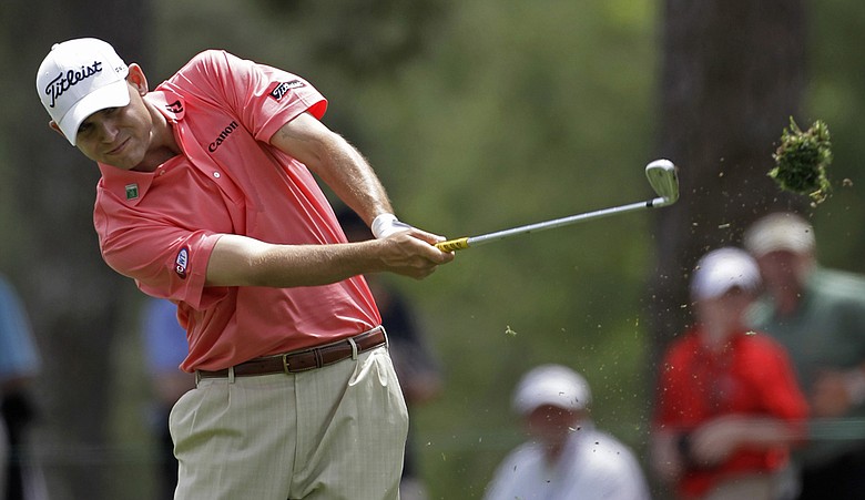 Bill Haas hits an approach shot during the third round of the Masters.