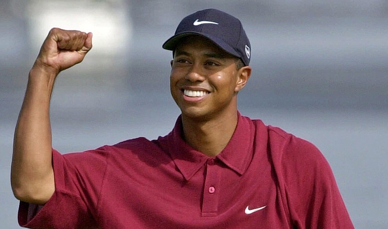 Tiger Woods celebrates after winning the 2000 U.S. Open at Pebble Beach.
