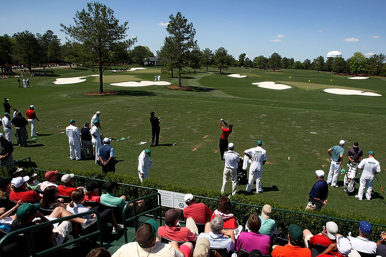 Players warm up on the new practice facility at Augusta National prior to the final round of the 2010 Masters.