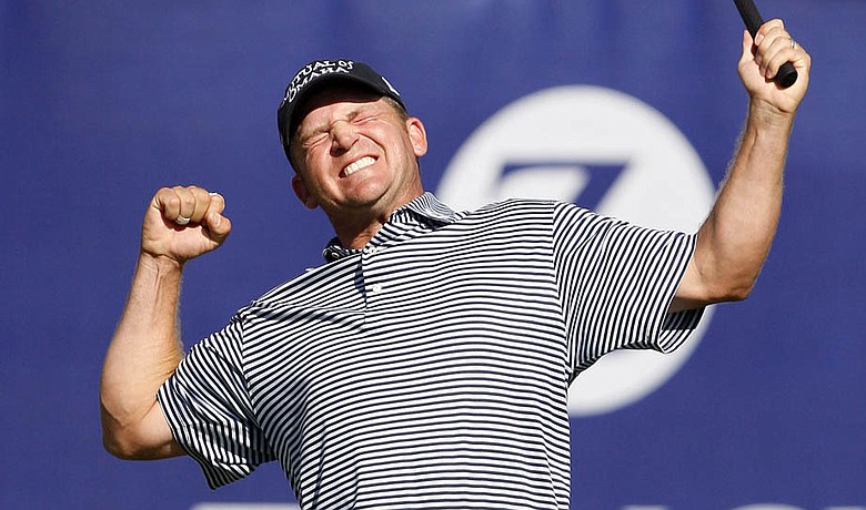 Jason Bohn celebrates on the 18th green after winning the Zurich Classic.