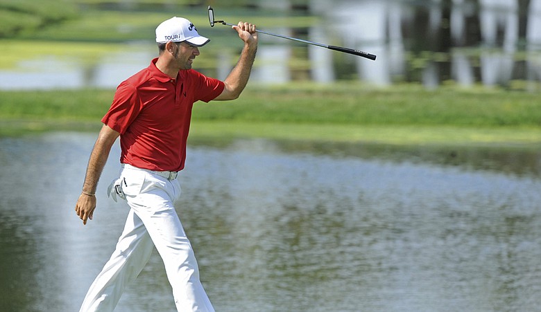 Alvaro Quiros walks toward the 18th green during Sunday's final round of the Spanish Open.